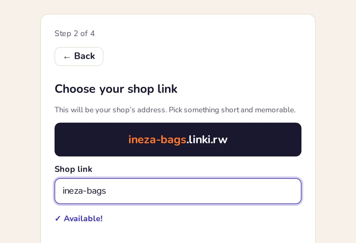 The sign-up step for choosing a shop address, showing the name typed in, a large preview of the full address, and a tick reading Available.
